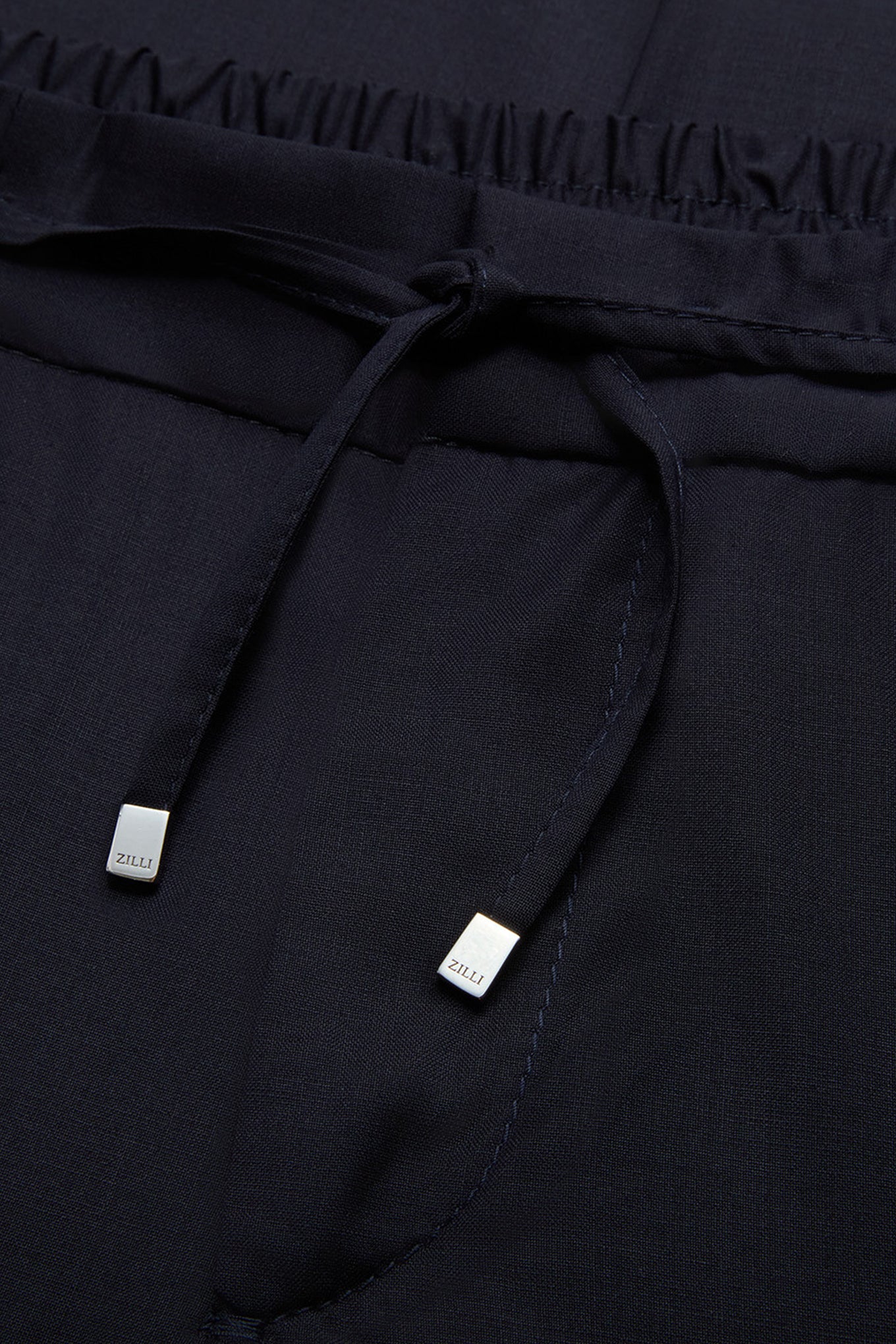 Dark navy blue “Metal Lion” trousers