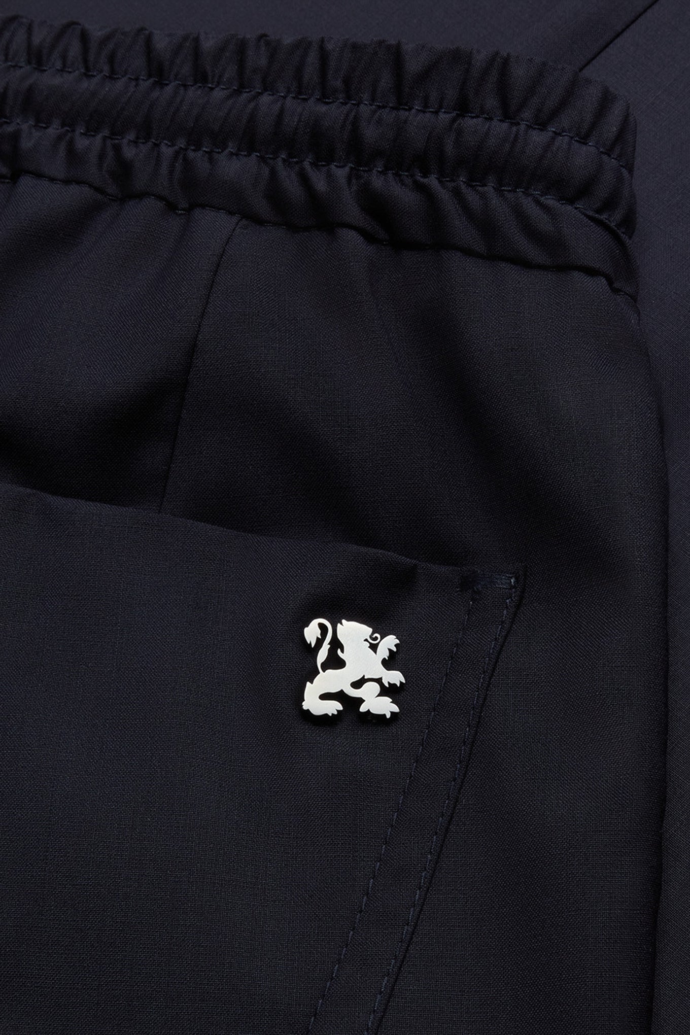 Dark navy blue “Metal Lion” trousers